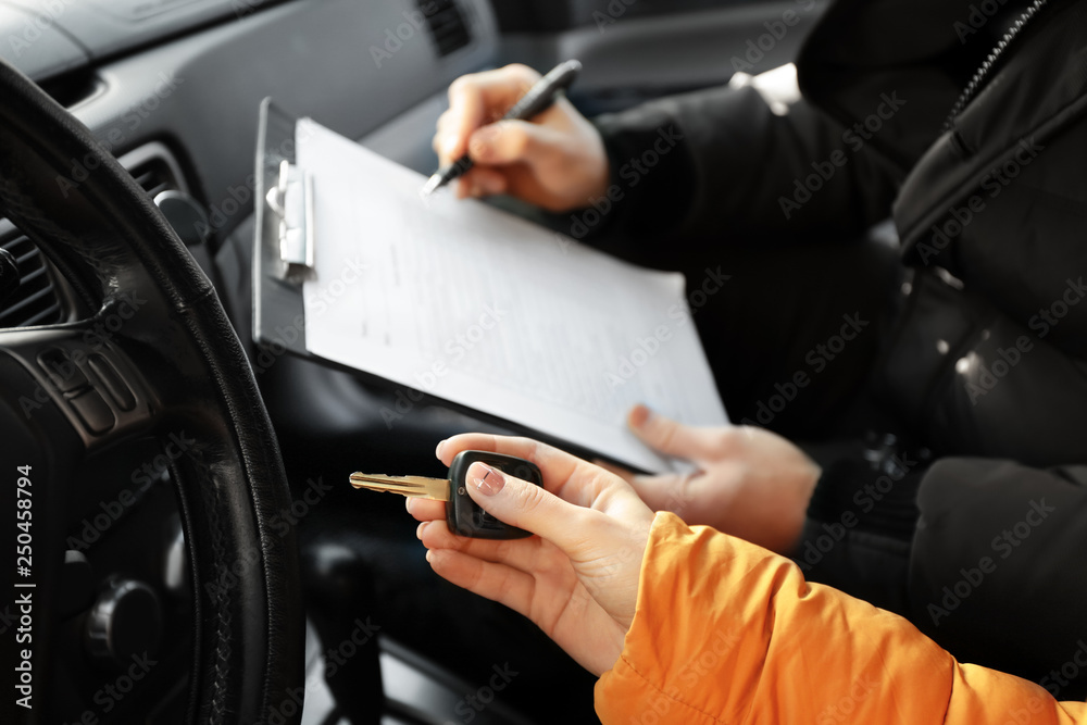 Young woman passing driving license test