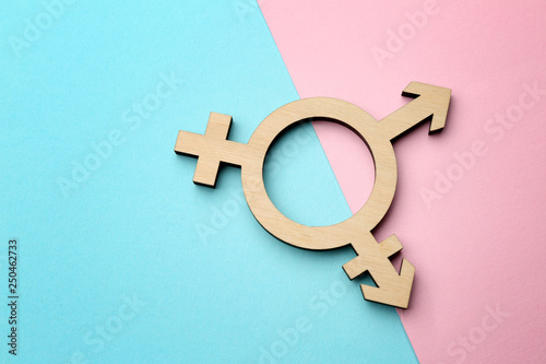 Symbol of transgender on color background photo