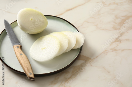 Sliced White Onion and Knif...