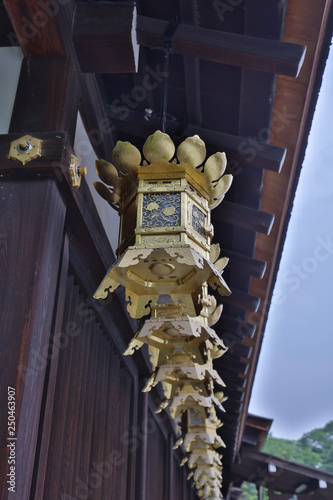 Gold bell of the famous Shimogamo Jinja at Kyoto Japan photo