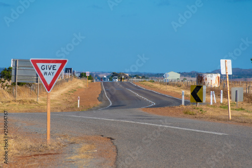 Give Way street sign at on of Australias endless Outback roads