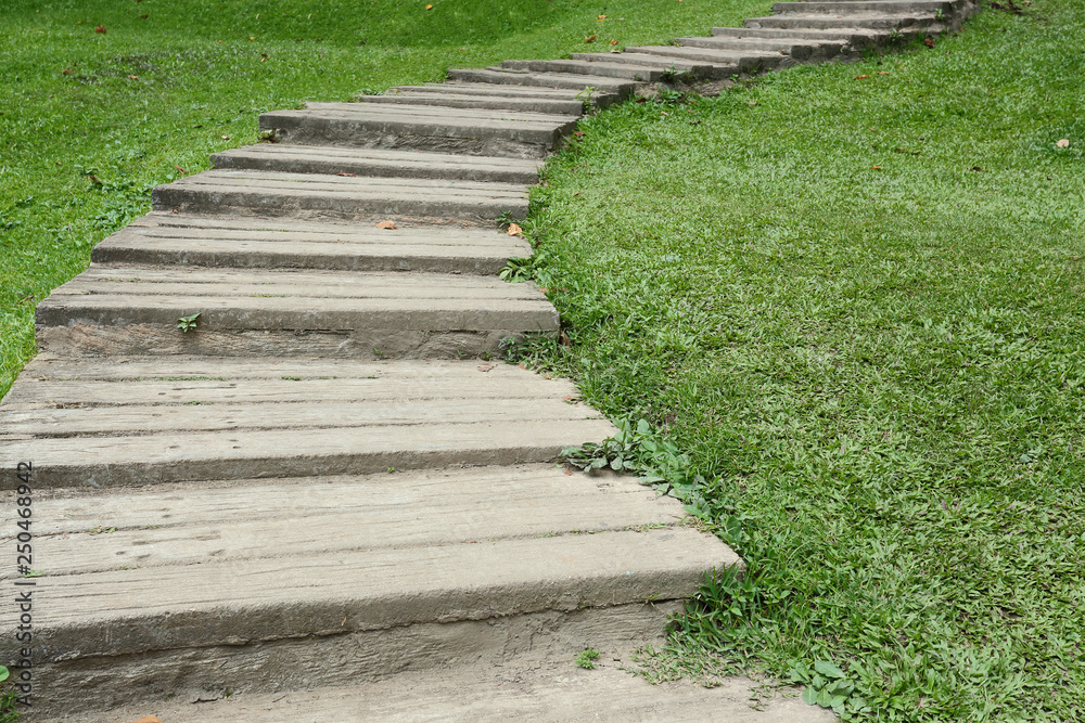 garden path walkway on green grass turf garden path walkway on green grass turf