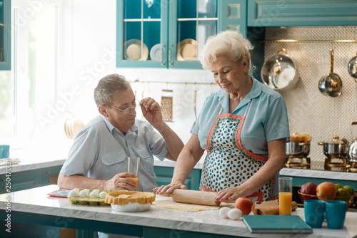 Old couple in kitchen