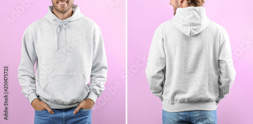 Man in blank hoodie sweater on color background, closeup. Mock up for desing