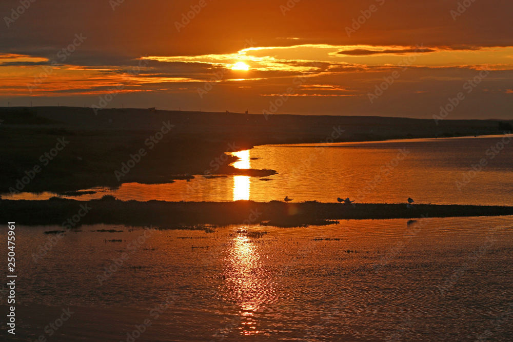 Naklejka premium Fleet Basin, Dorset at sunset