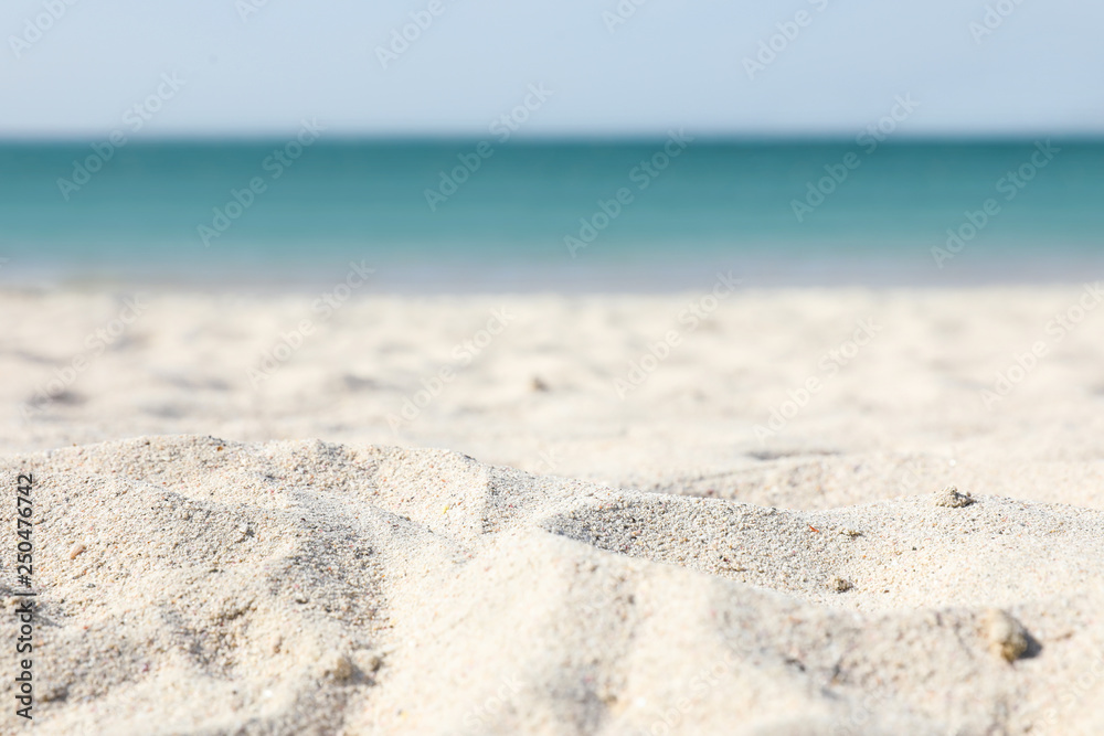 Beach with clean hot sand on sunny day, closeup. Space for text Beach with clean hot sand on sunny day, closeup. Space for text