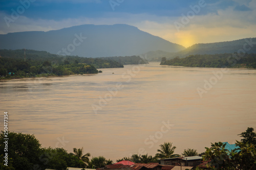 Beautiful landscape view of border village nearby Mun River Mouth, the point where the Mun and Mekong join in Khong Chiam District, the easternmost district of Ubon Ratchathani Province of Thailand. photo