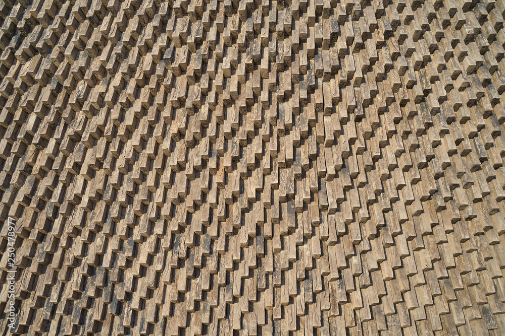 The image of the decorative surface made of wooden slats.
