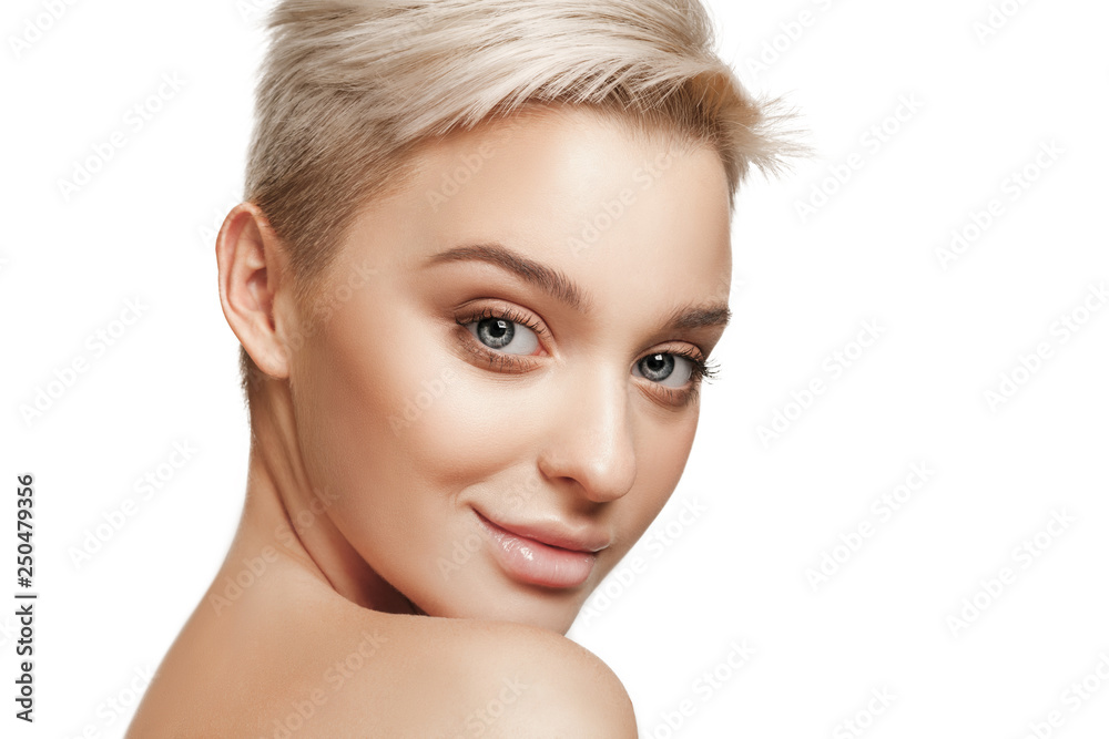 Fototapeta premium The beautiful female face. The perfect and clean skin of face on white. The beauty, care, skin, treatment, health, spa, cosmetic concept
