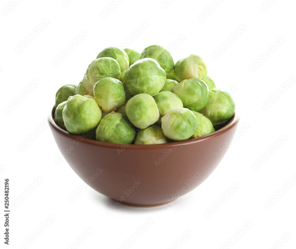 Bowl of fresh Brussels sprouts isolated on white Bowl of fresh Brussels sprouts isolated on white