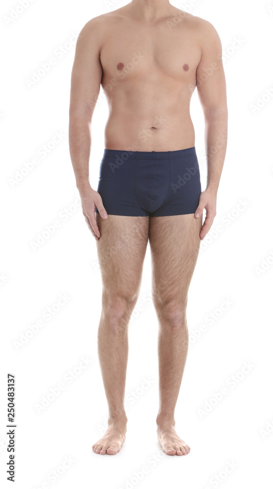 Young athletic man on white background, closeup. Weight loss Young athletic man on white background, closeup. Weight loss