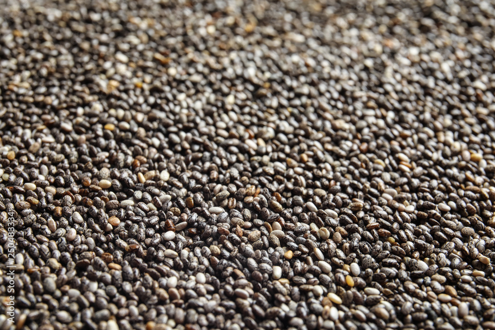 Chia seeds as background, closeup view. Organic superfood Chia seeds as background, closeup view. Organic superfood