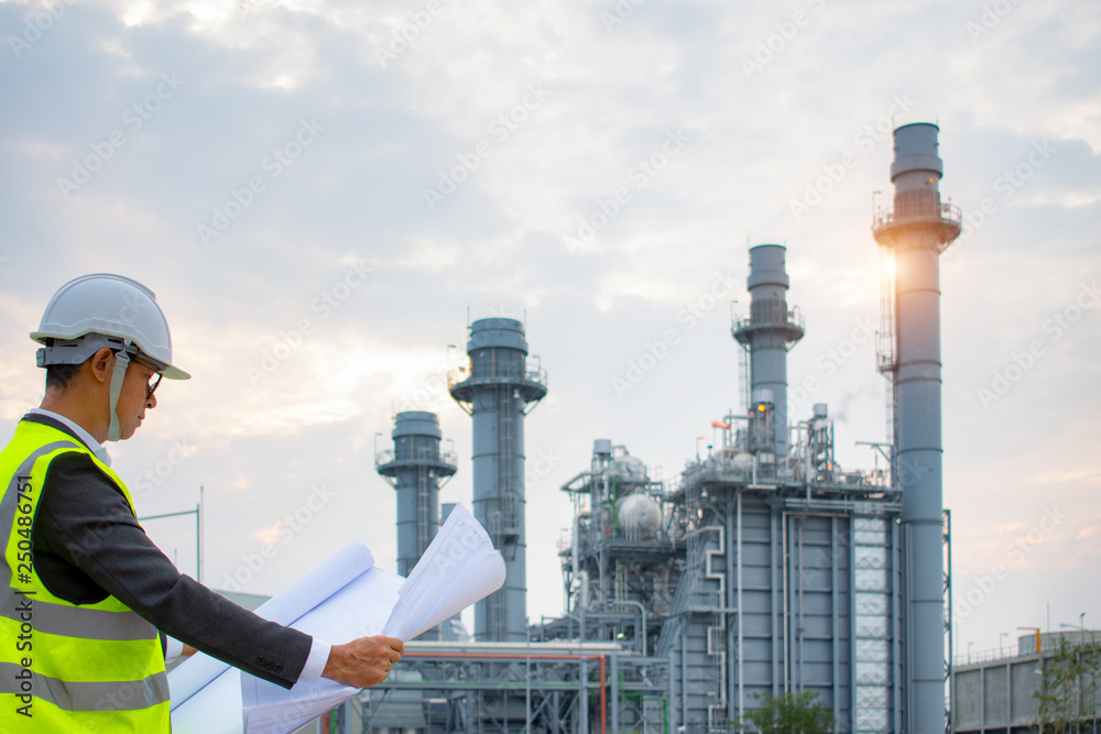 custom made wallpaper toronto digitalEngineers discussing maintenance of a petrochemical plant. Technical inspection. Oil and gas industry.