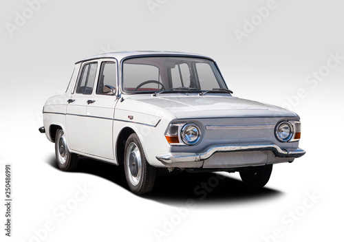 Classic white French family car isolated on white