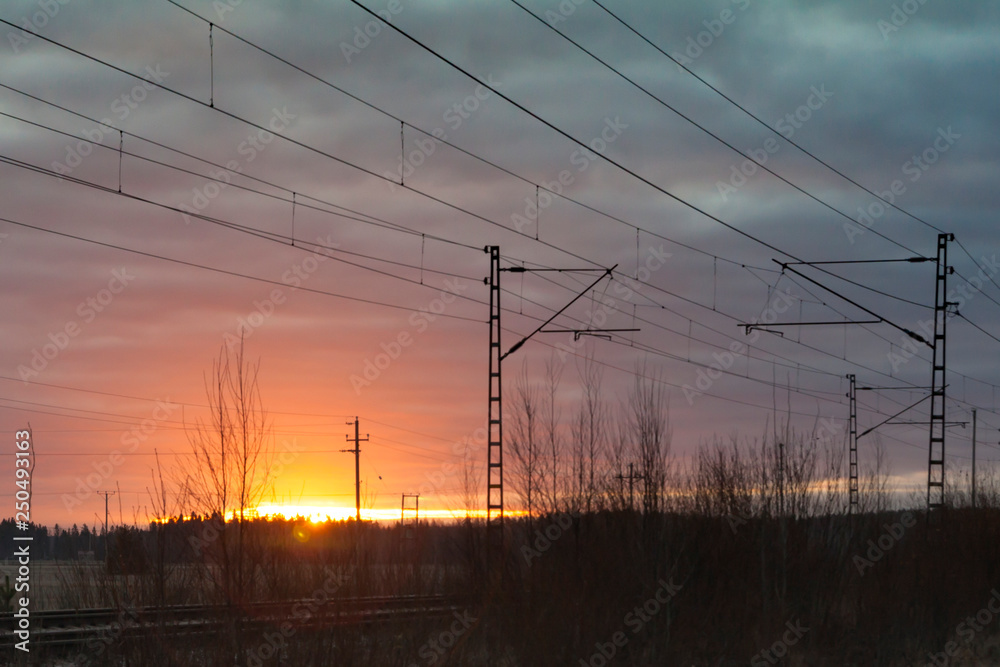 Beautiful sunrise at railroad at autumn in Finland.