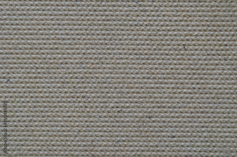 The surface texture of the cardboard embossed.