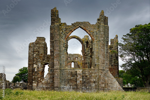 Back of Lindisfarne church ruins of the medieval priory on Holy Island of Lindisfarne Berwick-upon-Tweed England UK photo