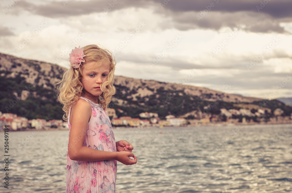 adorable little blond girl and the sea adorable little blond girl and the sea