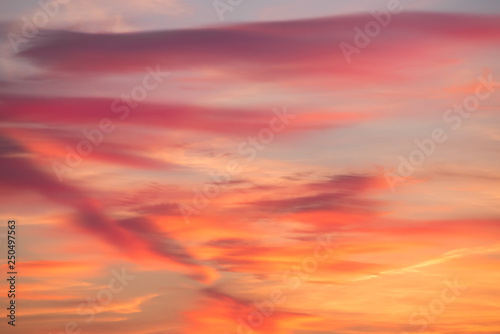 Red, crimson and purple clouds of evening sunset or morning daybreak © Oleh