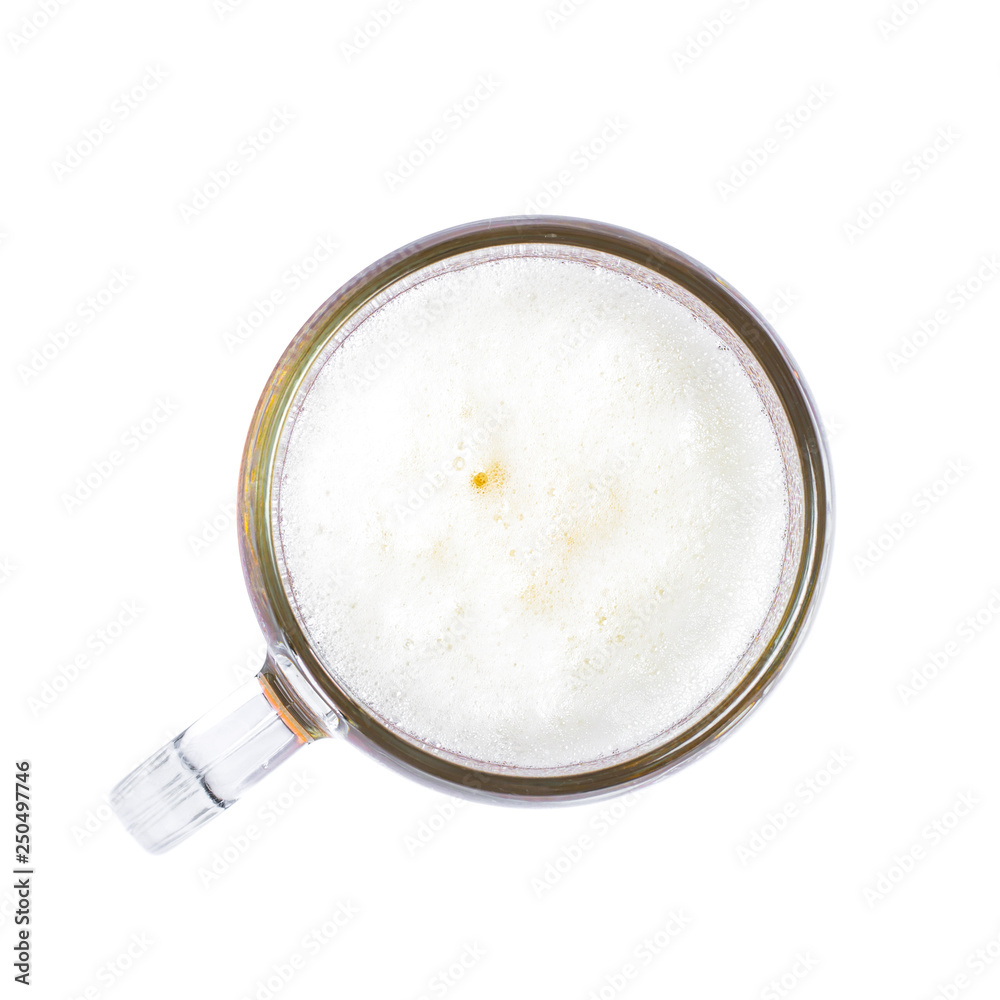Mug of beer with bubble on glass isolated on white background top view