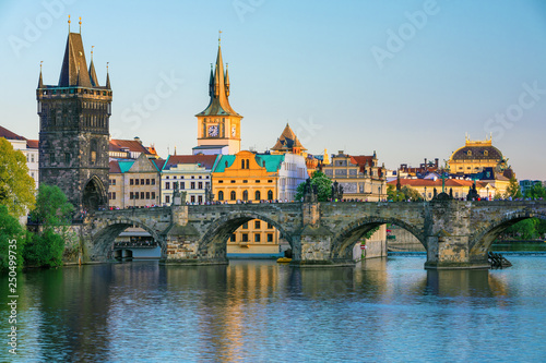 Scenic view on Vltava rive  Charles bridge and historical center of Prague  buildings and landmarks of old town at sunset  Prague  Czech Republic