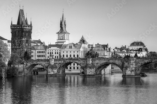 Scenic view on Vltava rive, Charles bridge and historical center of Prague, buildings and landmarks of old town at sunset, Prague, Czech Republic