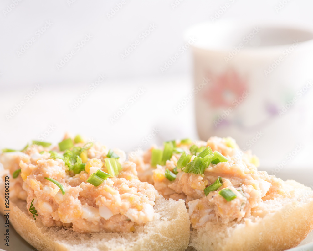 sandwiches and cup of coffee on a light background on a served table sandwiches and cup of coffee on a light background on a served table