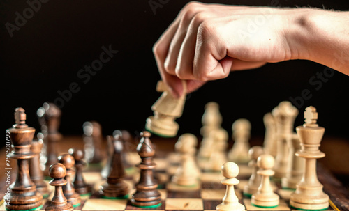 chess player takes a piece for the next move
