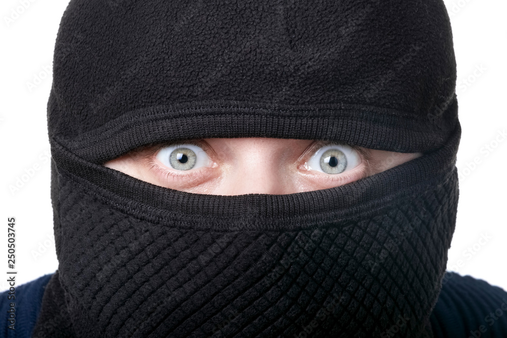 closeup portrait of the criminal in balaclava closeup portrait of the criminal in balaclava