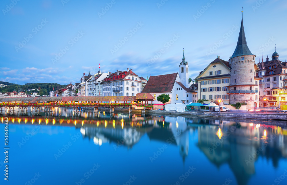 Scenic historic city center of Lucerne with famous buildings and lake Lucerne (Vierwaldstattersee), Canton of Lucerne, Switzerland Scenic historic city center of Lucerne with famous buildings and lake Lucerne (Vierwaldstattersee), Canton of Lucerne, Switzerland