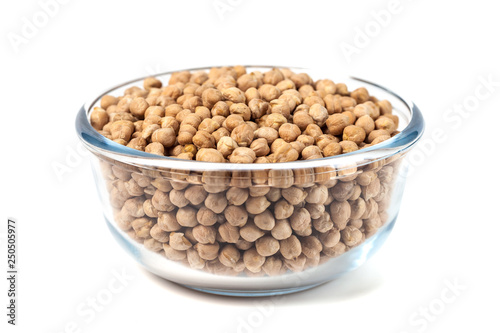 Chickpeas on glass bowl on white background
