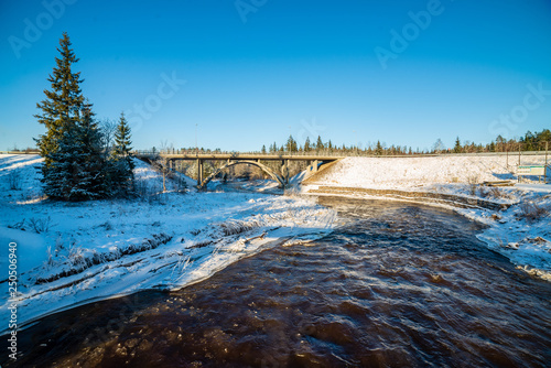 frozen forest river in winter