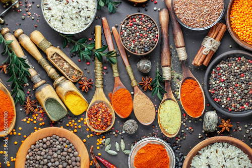Fototapeta Naklejka Na Ścianę i Meble -  Spices and seasonings for cooking in the composition on the table