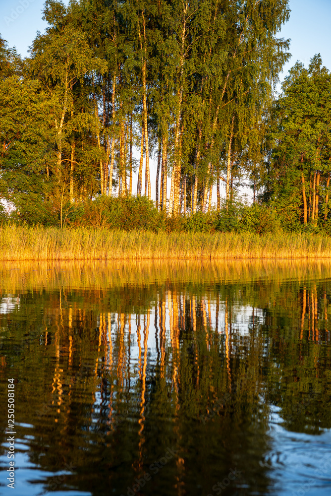 calm weather sunset on country lake calm weather sunset on country lake