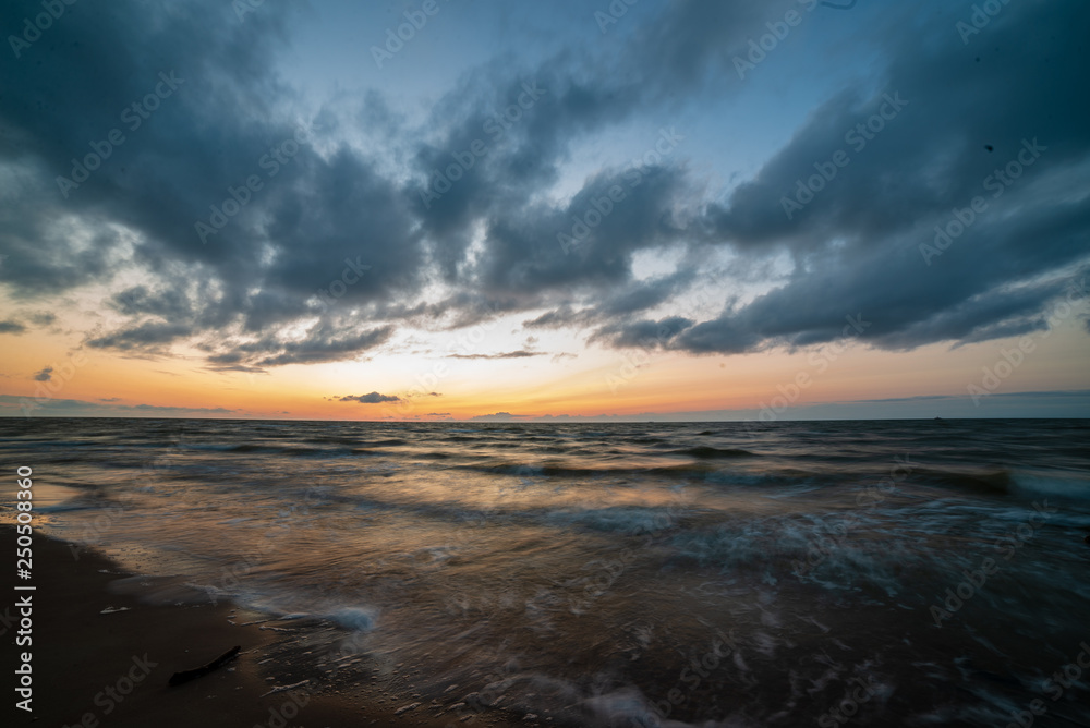 colorful sunset on the sea beach in summer colorful sunset on the sea beach in summer