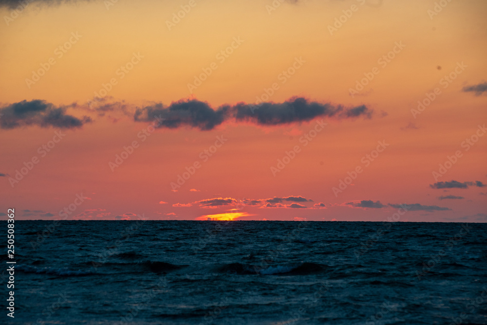 colorful sunset on the sea beach in summer colorful sunset on the sea beach in summer