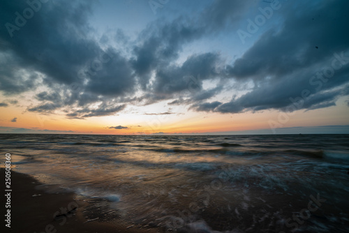 colorful sunset on the sea beach in summer