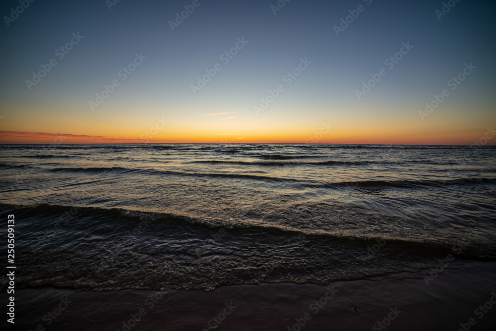 colorful sunset on the sea beach in summer colorful sunset on the sea beach in summer