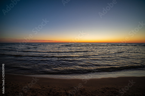 Fototapeta Naklejka Na Ścianę i Meble -  colorful sunset on the sea beach in summer