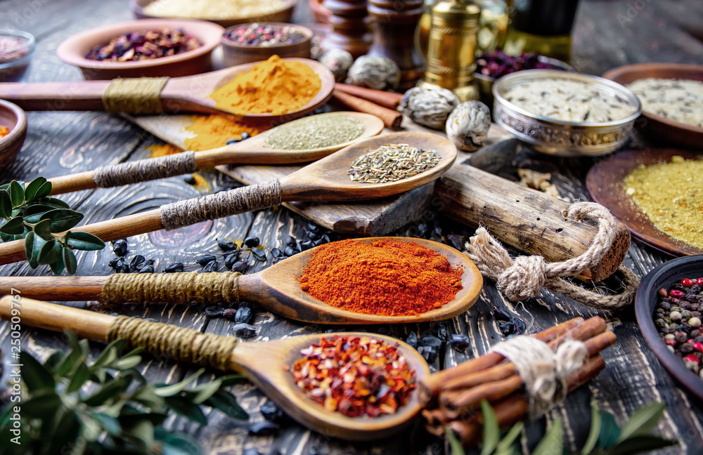 Fototapeta premium Spices and seasonings for cooking in the composition on the table