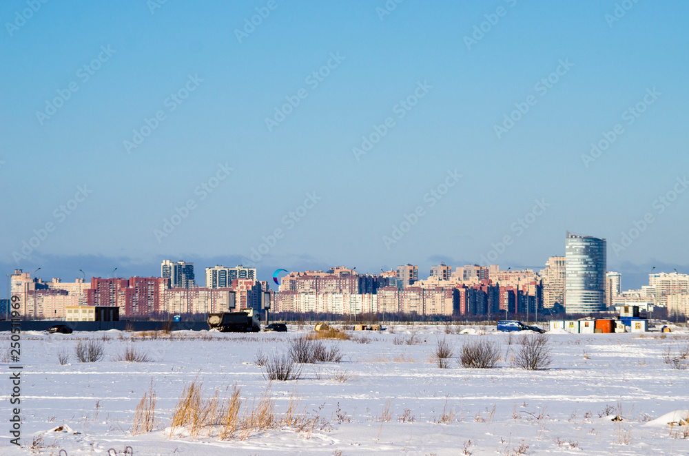 Obraz premium City panorama of winter St. Petersburg, a new modern district of the city, Russia, St. Petersburg, March 9, 2018