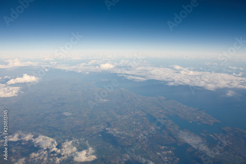 view to England from side window of airplane