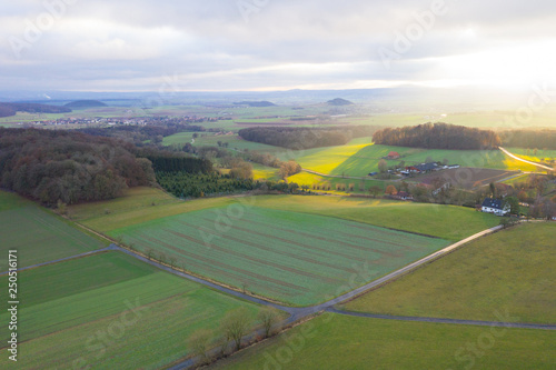 village from above in the countryside of germany with hills and forrest
