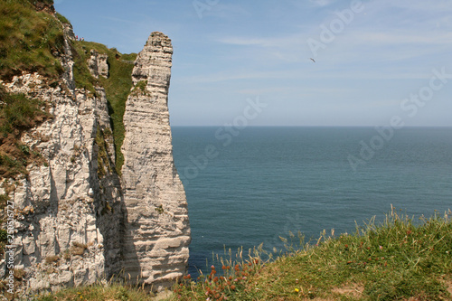 High,chalk cliffs of The France village of Etretat
