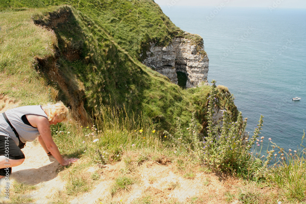 High,chalk cliffs of The France village of Etretat