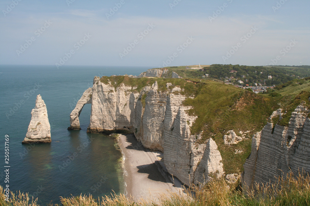 High,chalk cliffs of The France village of Etretat