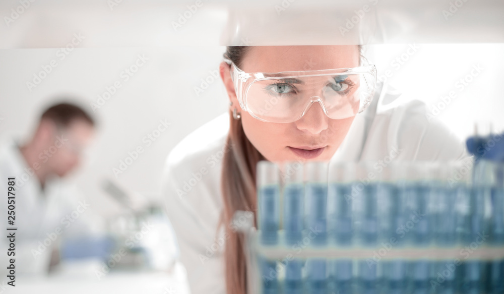 close up.scientist doing research in clinical laboratory. close up.scientist doing research in clinical laboratory.