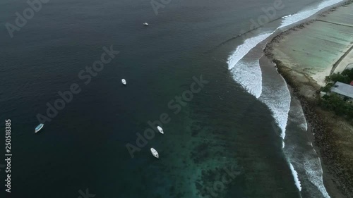 Good waves for surfing in the Maldives. Look from drone