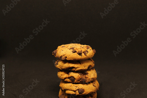 Wallpaper Mural chocolate chip cookies on black background Torontodigital.ca