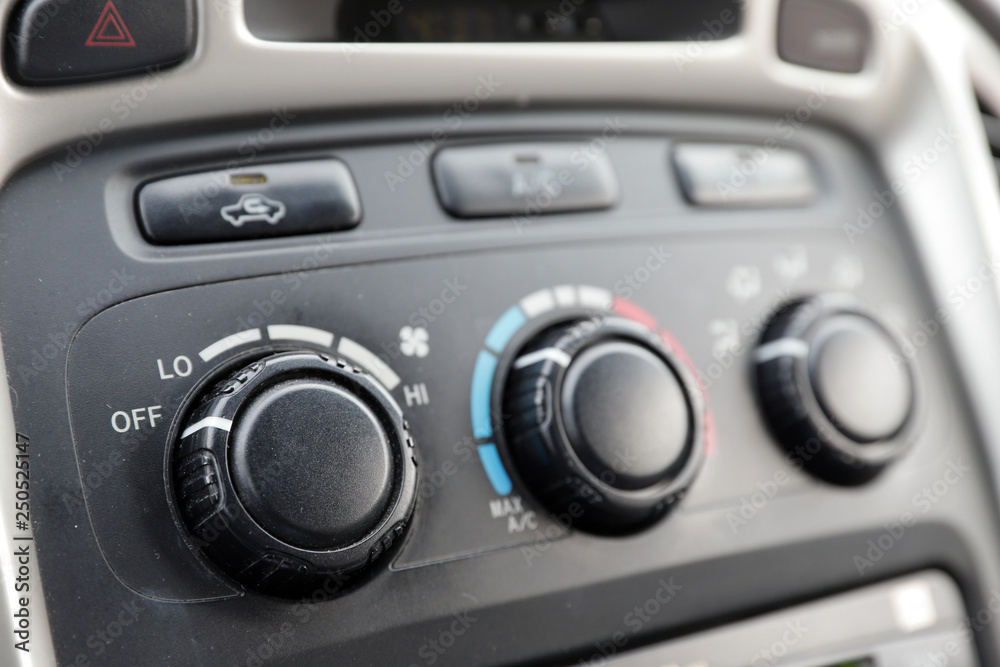 Automobile climate controls on dashboard Automobile climate controls on dashboard